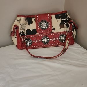 Purse unknown brand no tag.  Red trim,  lots of bling.